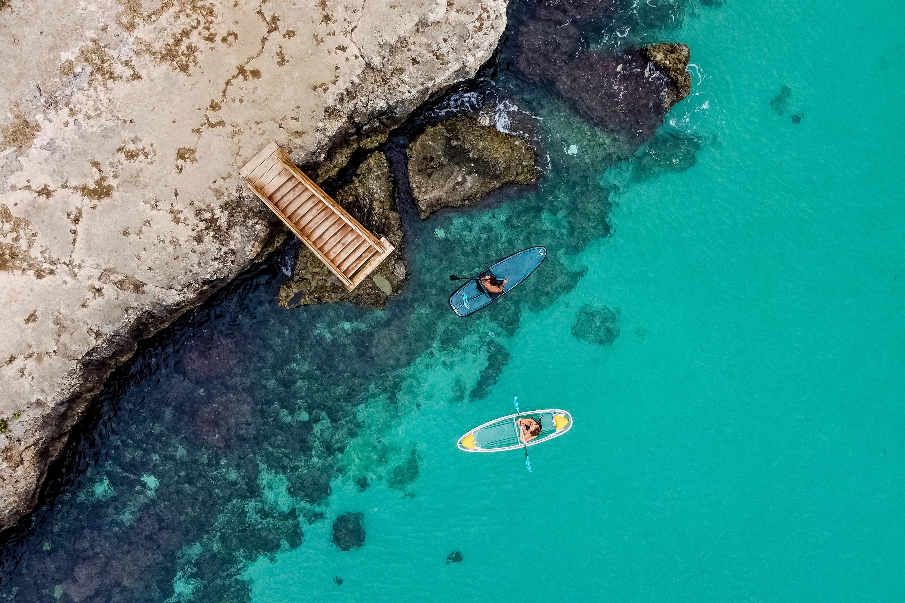 Man and woman riding Fliteboard Scooters